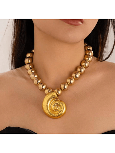 Oversized Gold Seashell Necklace on oversized Gold Beads